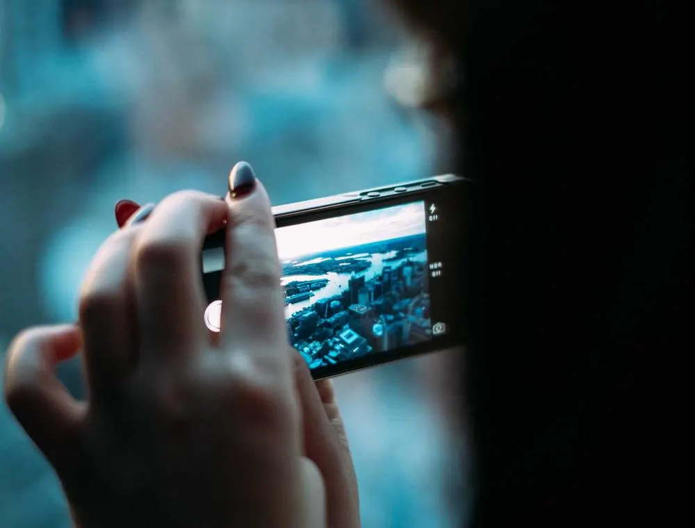 Someone taking a photo with a phone